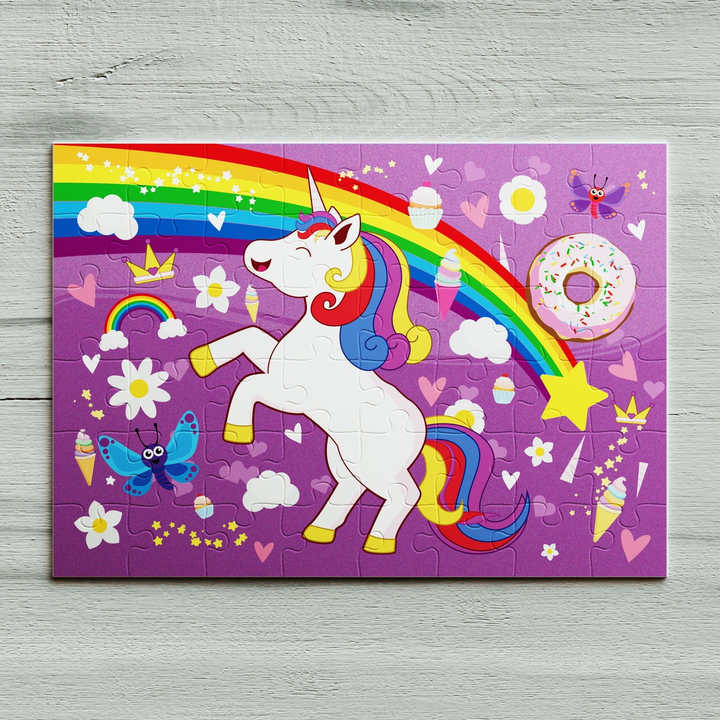 48 piece kids unicorn jigsaw puzzle under rainbow. 